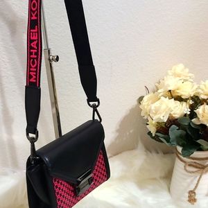 Michael Kors small bag. Pink and black. Short straps,made for a short person.